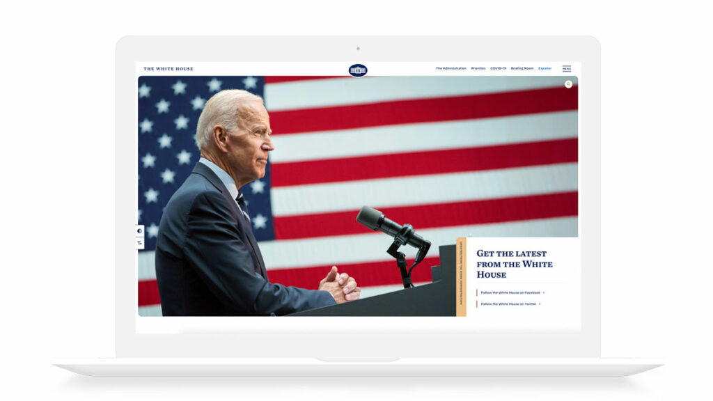 Image of a Mac screen with the front page of the White House website up. The front page shows a large image of President Joe Biden with the American flag in the background.